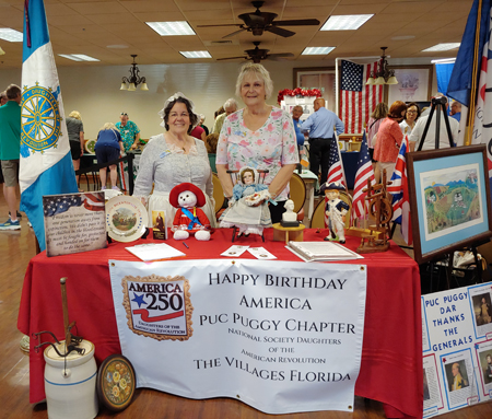 2 women in Colonial dress